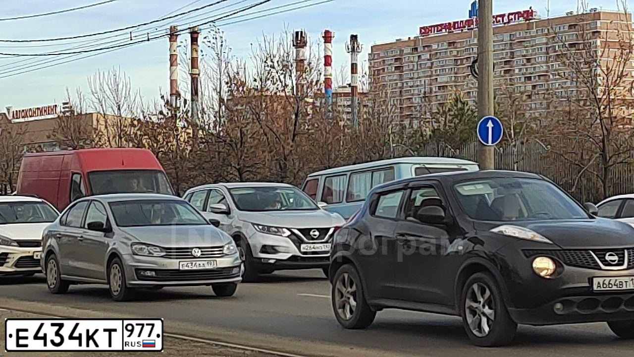 Фото автомобиля LADA 2109 SAMARA, 2002 — госномер Е434КТ977. Цвет: Темно-зеленый