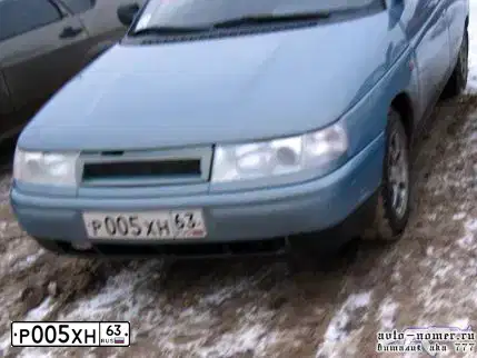 Фото автомобиля OPEL ASTRA, 2012 — госномер Р005ХН63. Цвет: БЕЛЫЙ