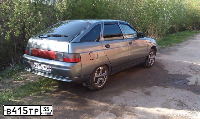 Фото автомобиля LADA 2112, 2005 — госномер Н439ТТ35. Цвет: СРЕДНИЙ СЕРО-ЗЕЛЕНЫЙ МЕТ.