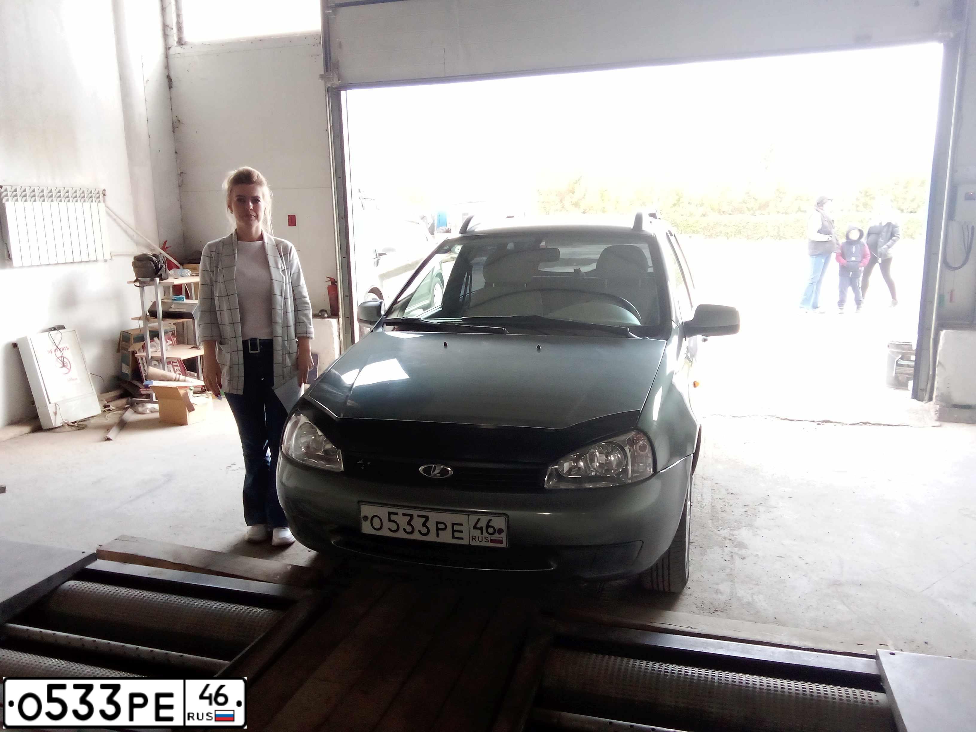 Фото автомобиля LADA 1117 KALINA, 2009 — госномер О533РЕ46. Цвет: Темно-серый металлик
