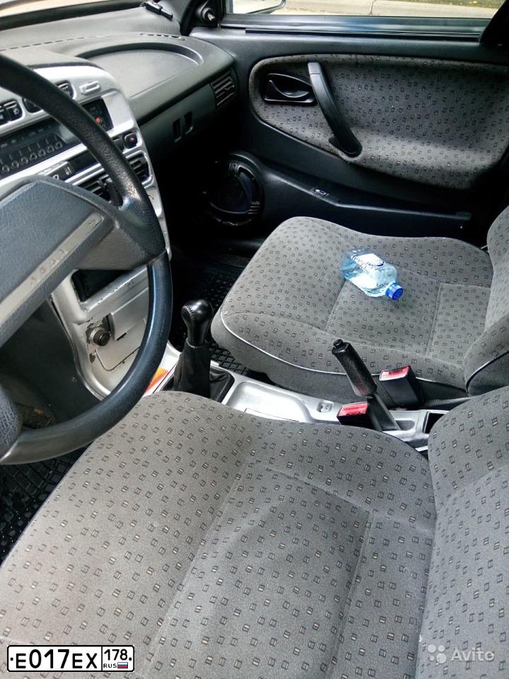 Фото автомобиля OPEL VECTRA, 1997 — госномер Е017ЕХ178. Цвет: ЧЕРНЫЙ