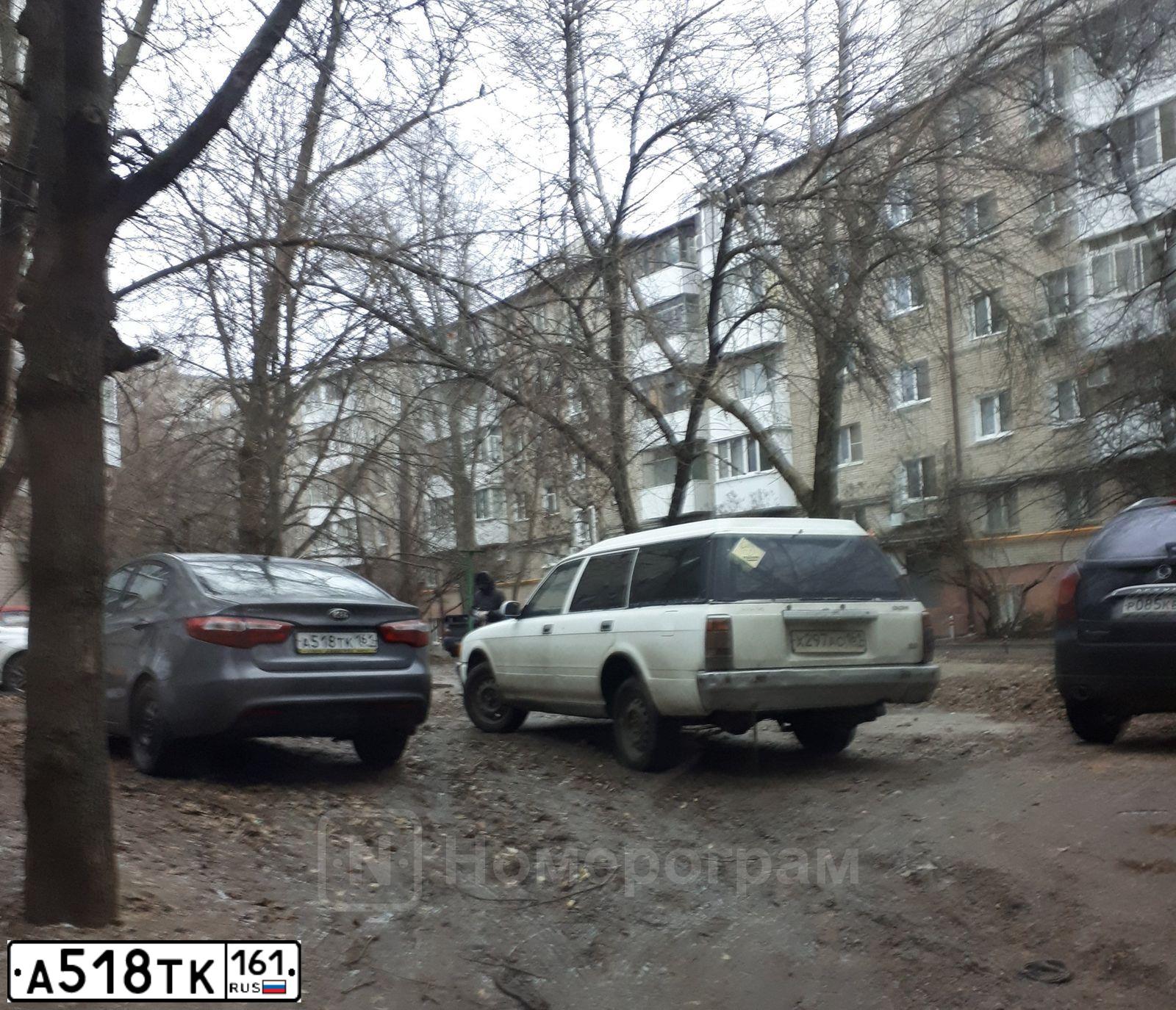 Фото автомобиля KIA RIO, 2014 — госномер А518ТК161. Цвет: ТЕМНО-СЕРЫЙ