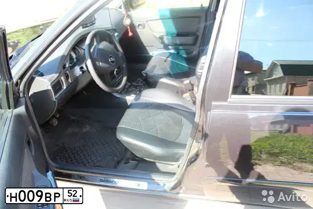 Фото автомобиля DAEWOO NEXIA, 2011 — госномер Н009ВР52. Цвет: ЧЕРНЫЙ
