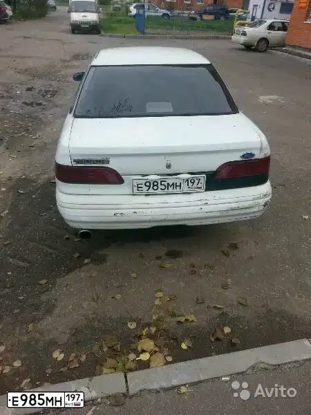Фото автомобиля FORD TAURUS, 1992 — госномер Е985МН197. Цвет: БЕЛЫЙ