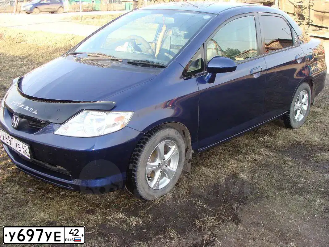 Фото автомобиля LADA 2170 PRIORA, 2010 — госномер У697УЕ42. Цвет: СВЕТЛО-СЕРЕБРИСТЫЙ МЕТАЛЛ