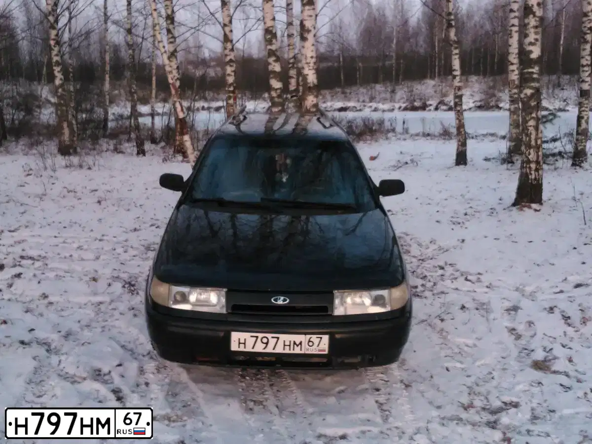 Фото автомобиля LADA 2112, 2002 — госномер Н797МН67. Цвет: ЧЕРНЫЙ