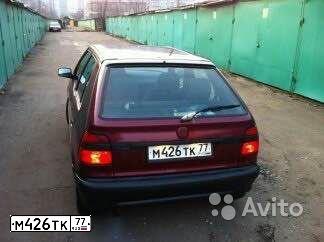 Фото автомобиля SKODA FELICIA, 1997 — госномер К027НН82. Цвет: ВИШНЕВЫЙ