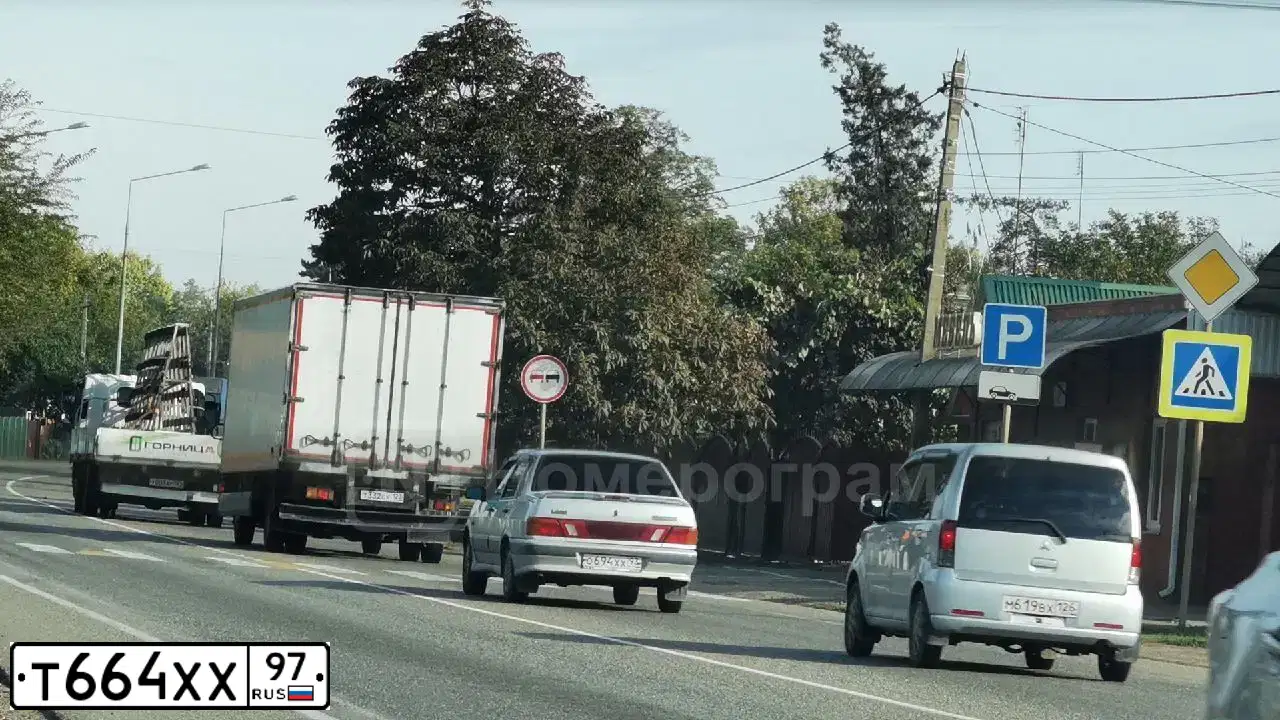 Фото автомобиля MITSUBISHI LANCER, 2005 — госномер К485СЕ797. Цвет: Серебристый