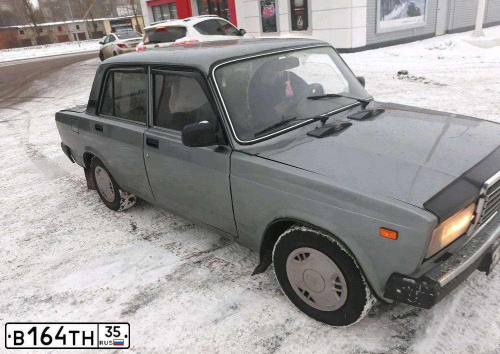Фото автомобиля LADA 2107, 2010 — госномер В164ТН35. Цвет: СРЕДНИЙ СЕРО-ЗЕЛЕНЫЙ МЕТ.