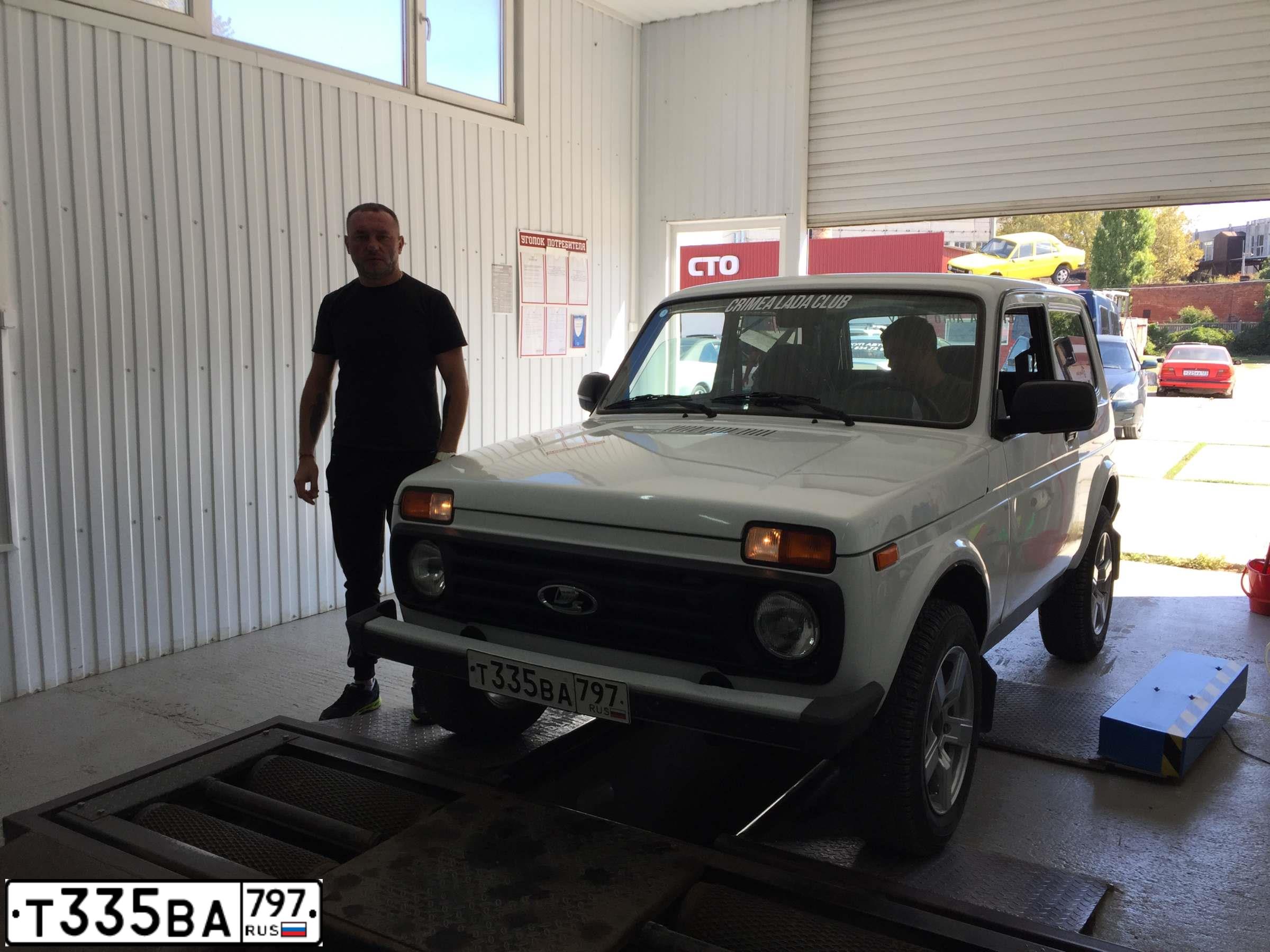 Фото автомобиля LADA 2121 NIVA, 2019 — госномер Т335ВА797. Цвет: Белый
