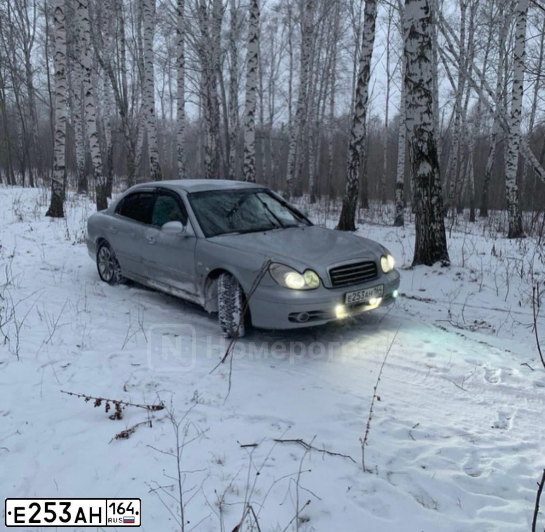 Фото автомобиля TAGAZ SONATA, 2005 — госномер Т400КТ64. Цвет: СЕРЕБРИСТЫЙ