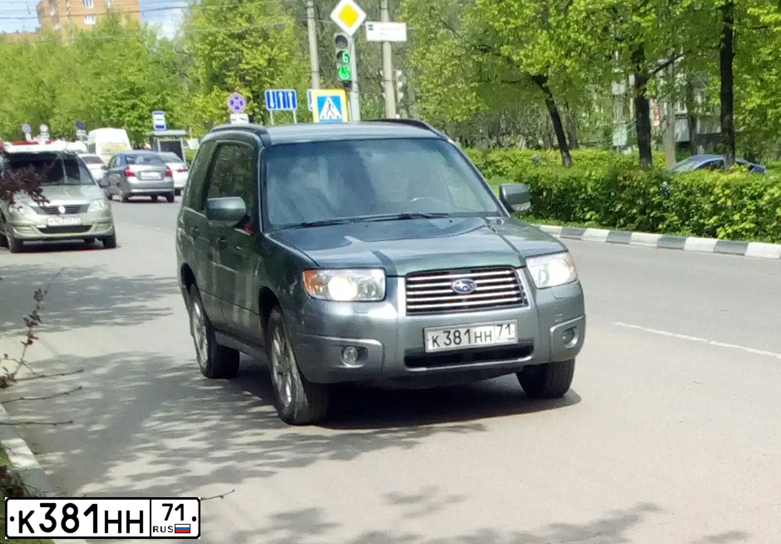 Фото автомобиля SUBARU FORESTER, 2006 — госномер О297СК71. Цвет: ЗЕЛЕНЫЙ