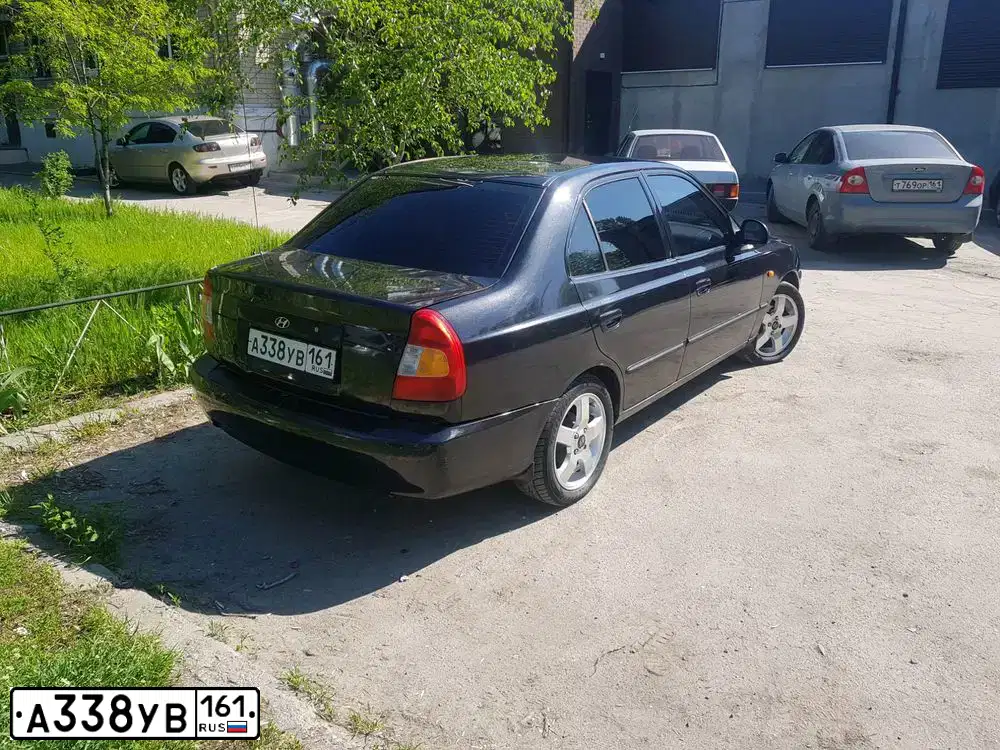 Фото автомобиля TAGAZ ACCENT, 2006 — госномер А209НМ761. Цвет: ЧЕРНЫЙ