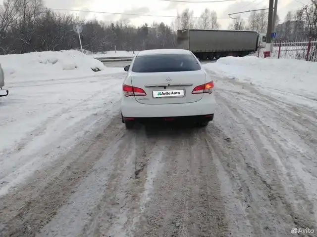 Фото автомобиля NISSAN ALMERA /AVTOVAZ/, 2016 — госномер С650УТ152. Цвет: Белый
