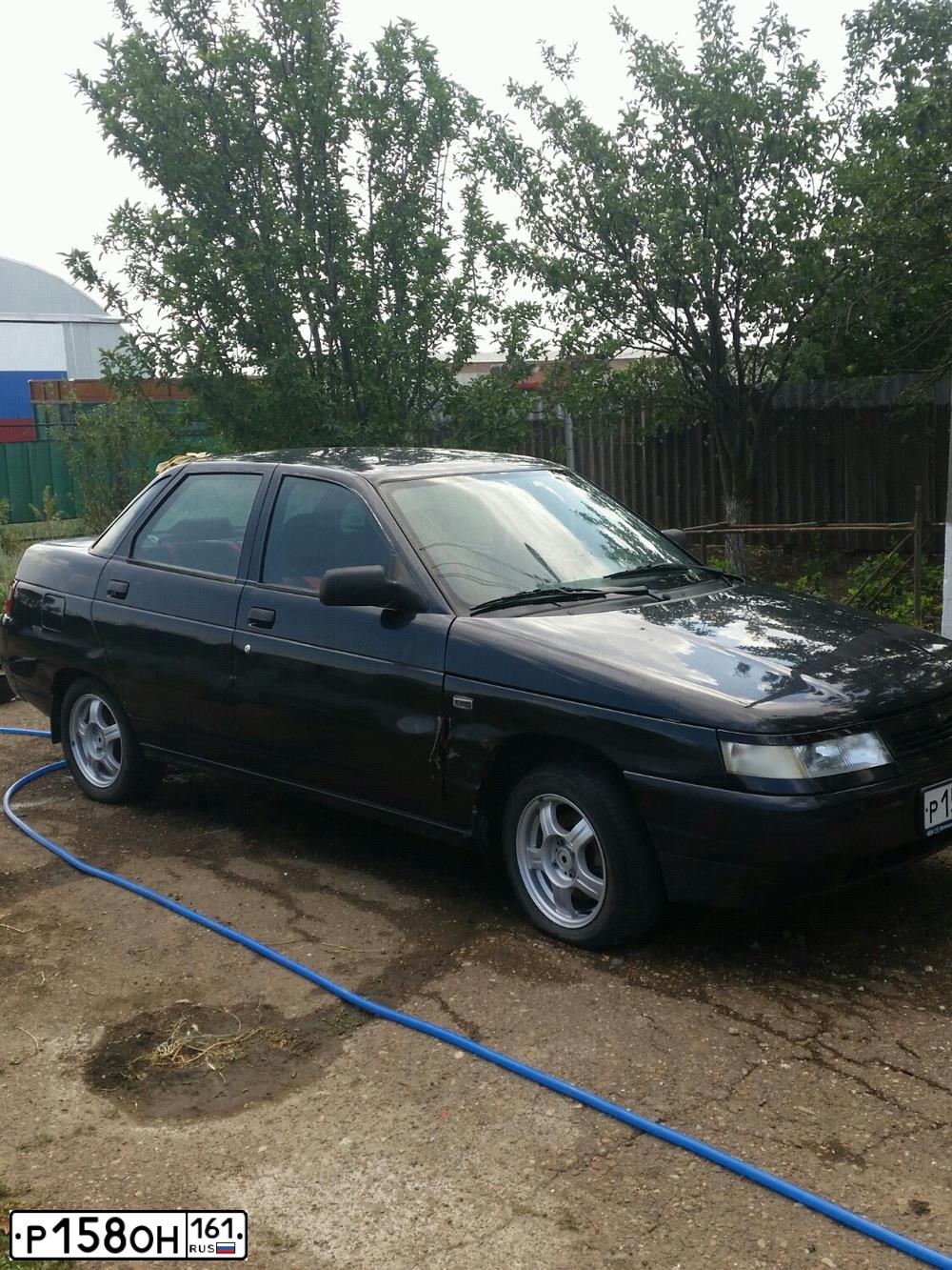 Фото автомобиля LADA 2110 BOGDAN, 2012 — госномер Е735РР08. Цвет: ЧЕРНЫЙ
