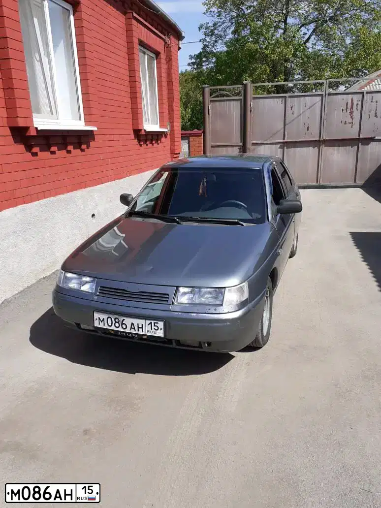 Фото автомобиля LADA 2112 LADA, 2007 — госномер М086АН15. Цвет: СРЕДНИЙ СЕРО-ЗЕЛЕН.МЕТАЛЛ