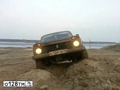 Фото автомобиля LADA 2121 NIVA, 1999 — госномер О128ТМ76. Цвет: ФИОЛЕТОВЫЙ
