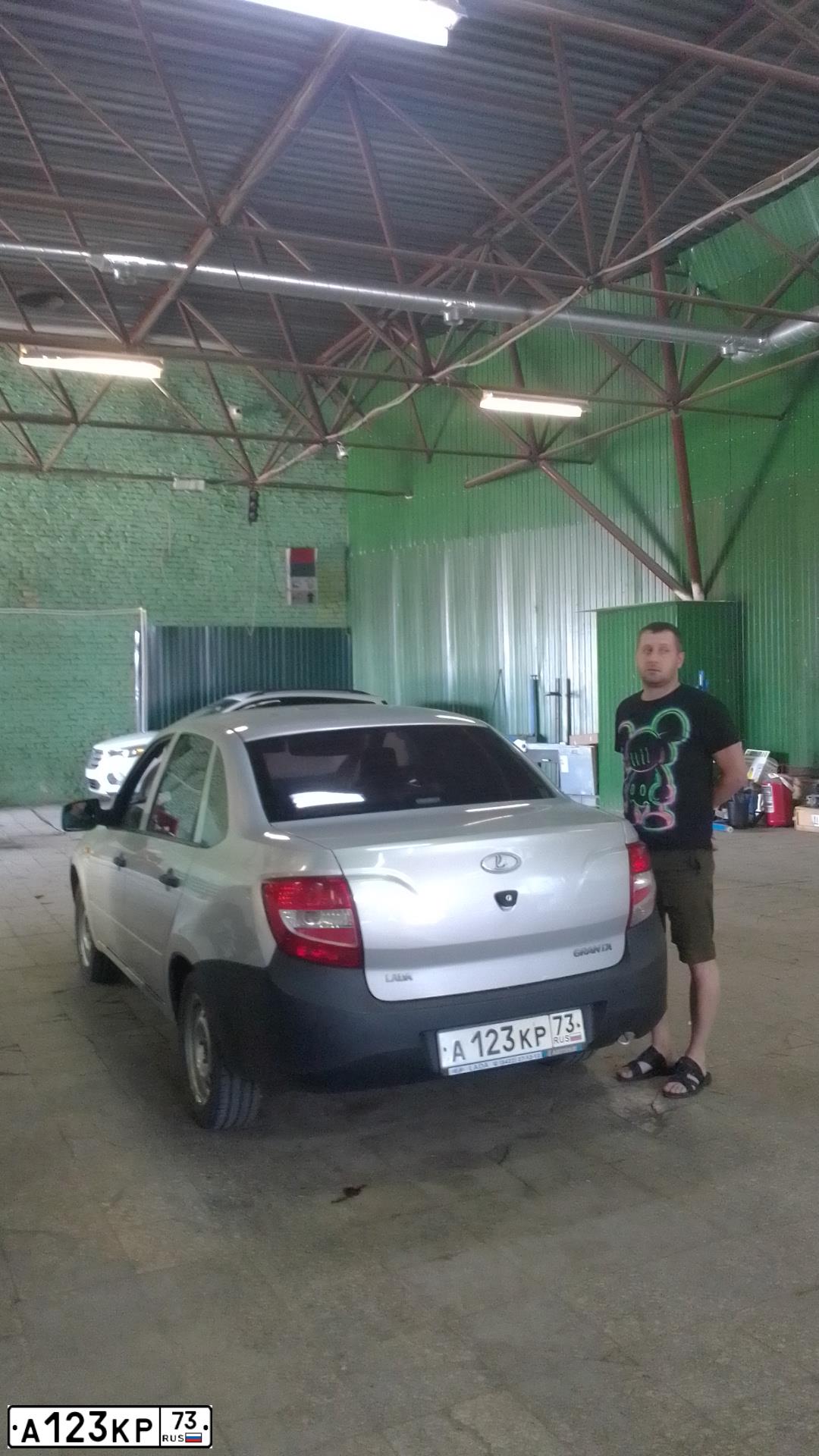 Фото автомобиля LADA 2190 GRANTA, 2012 — госномер А123КР73. Цвет: СЕРЫЙ