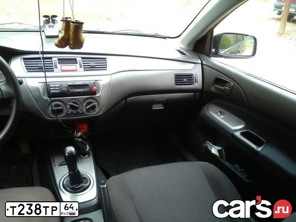 Фото автомобиля MITSUBISHI LANCER, 2006 — госномер Т238ТР64. Цвет: ЧЕРНЫЙ