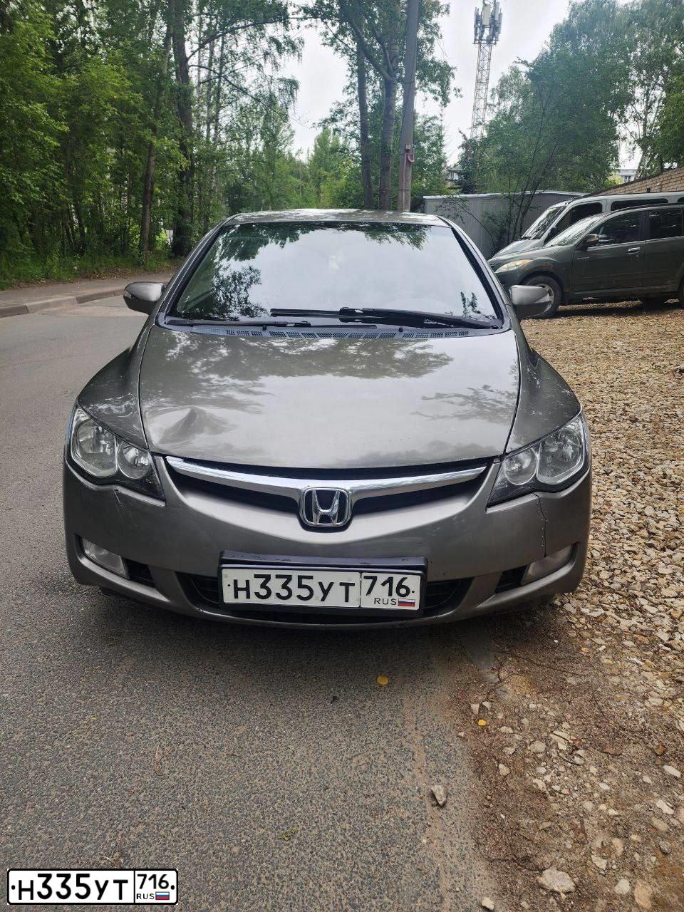 Фото автомобиля HONDA CIVIC, 2007 — госномер Н335УТ716. Цвет: СЕРЫЙ