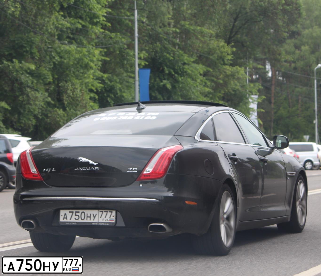 Фото автомобиля JAGUAR XJ-SERIE, 2014 — госномер М636НЕ198. Цвет: ЧЕРНЫЙ