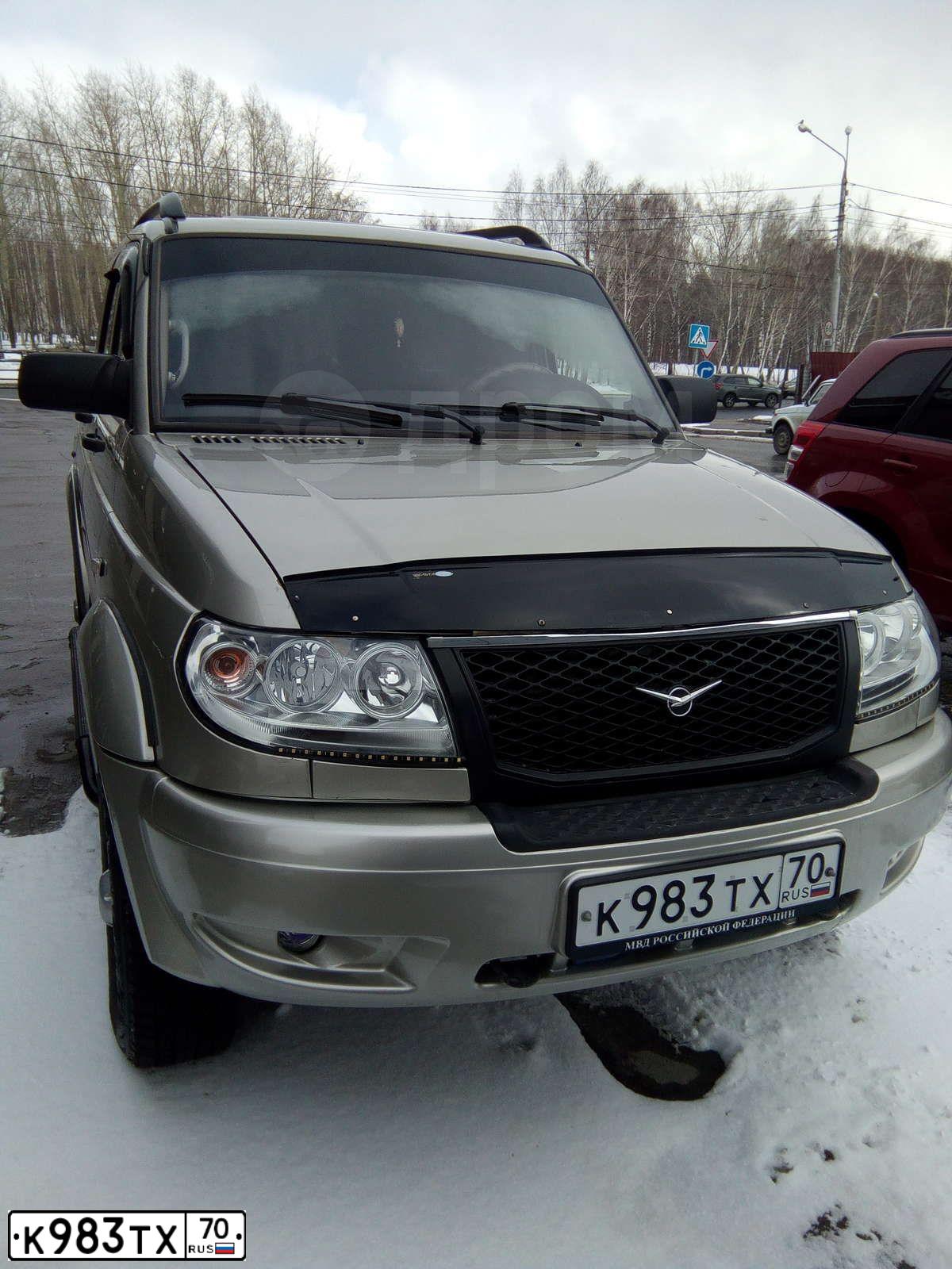 Фото автомобиля UAZ 3163 PATRIOT, 2012 — госномер Р248РТ124. Цвет: ЗОЛОТИСТЫЙ