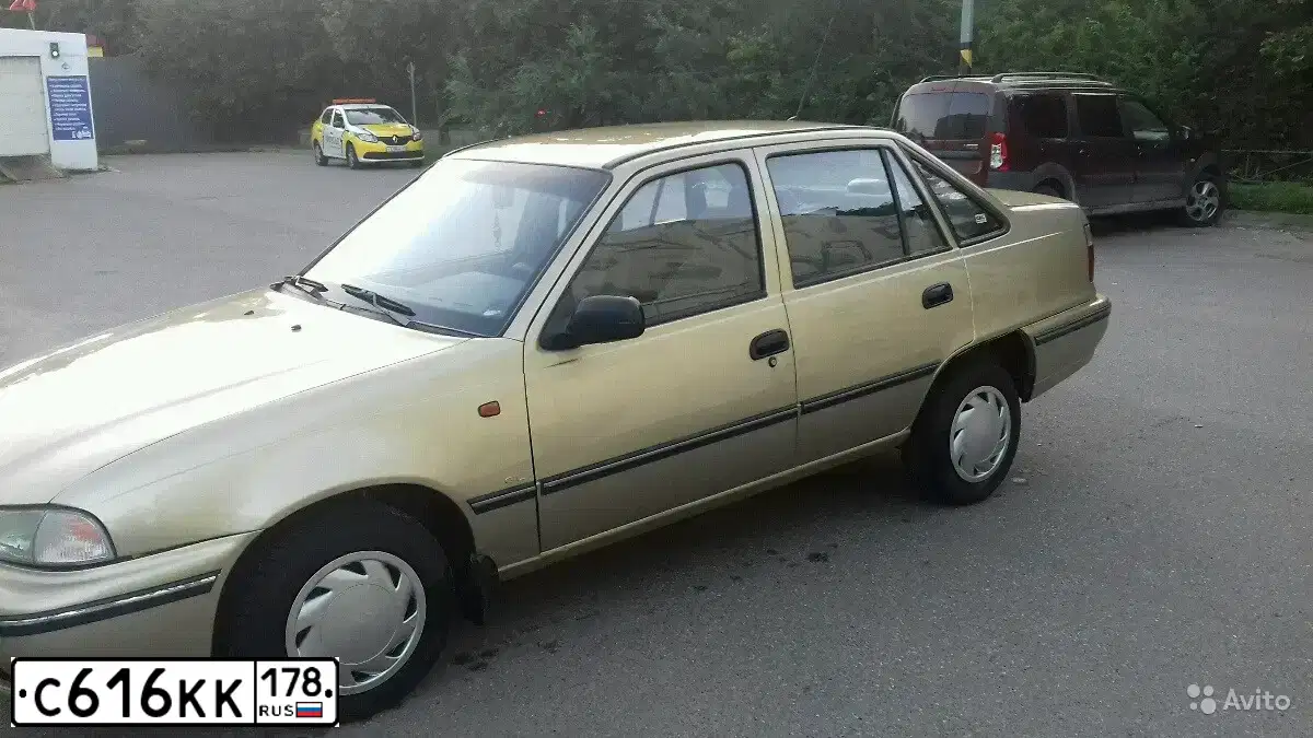 Фото автомобиля DAEWOO NEXIA, 2007 — госномер С616КК178. Цвет: БЕЖЕВО-СЕРЫЙ