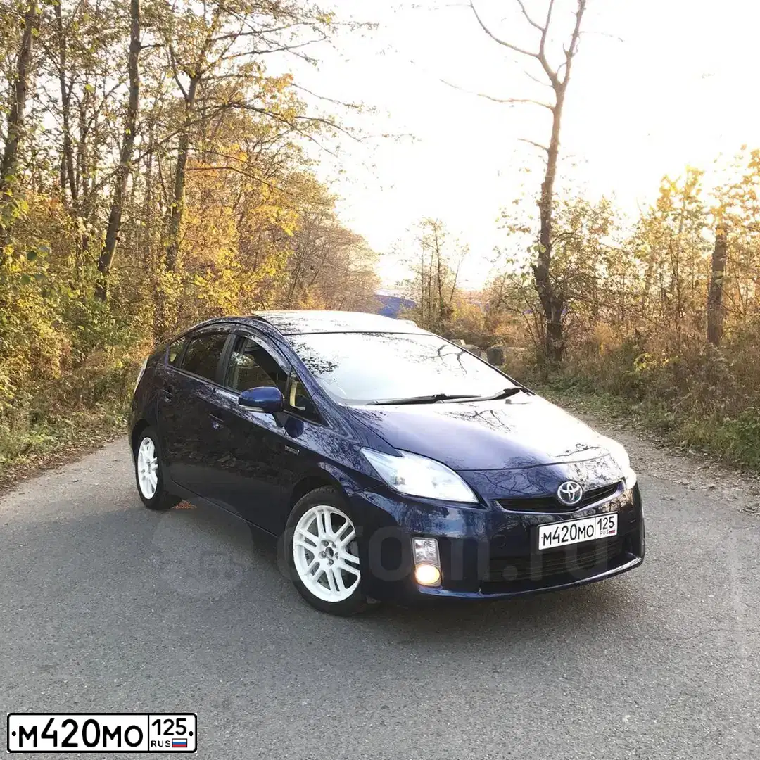 Фото автомобиля TOYOTA PRIUS, 2009 — госномер Н893КР28