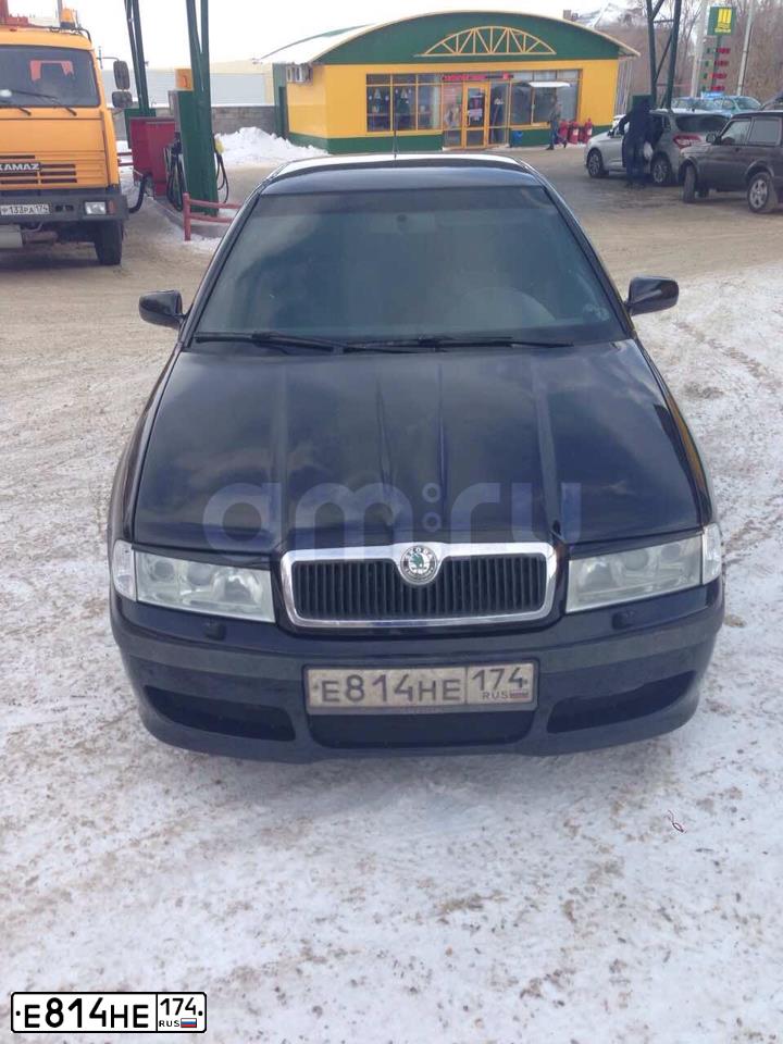 Фото автомобиля SKODA OCTAVIA, 2006 — госномер Е814НЕ174. Цвет: ЧЕРНЫЙ