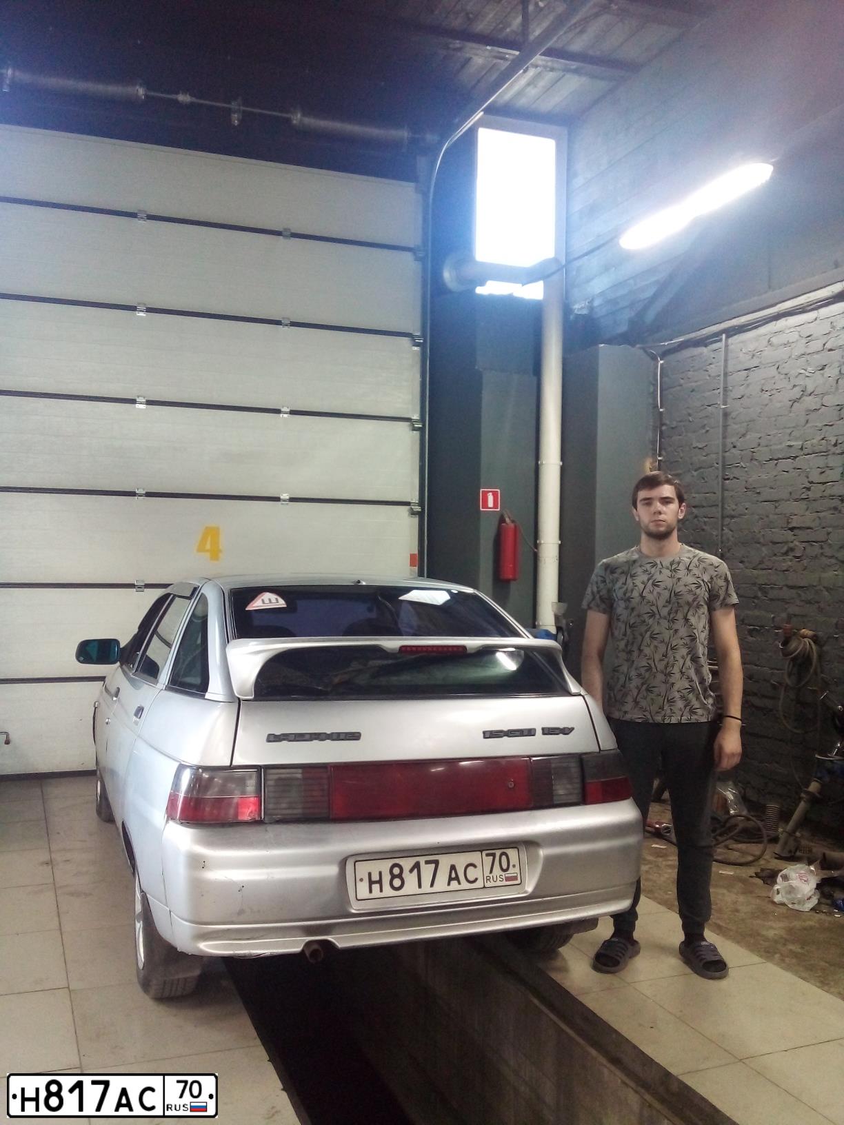 Фото автомобиля LADA 2112, 2003 — госномер Е824ХА124
