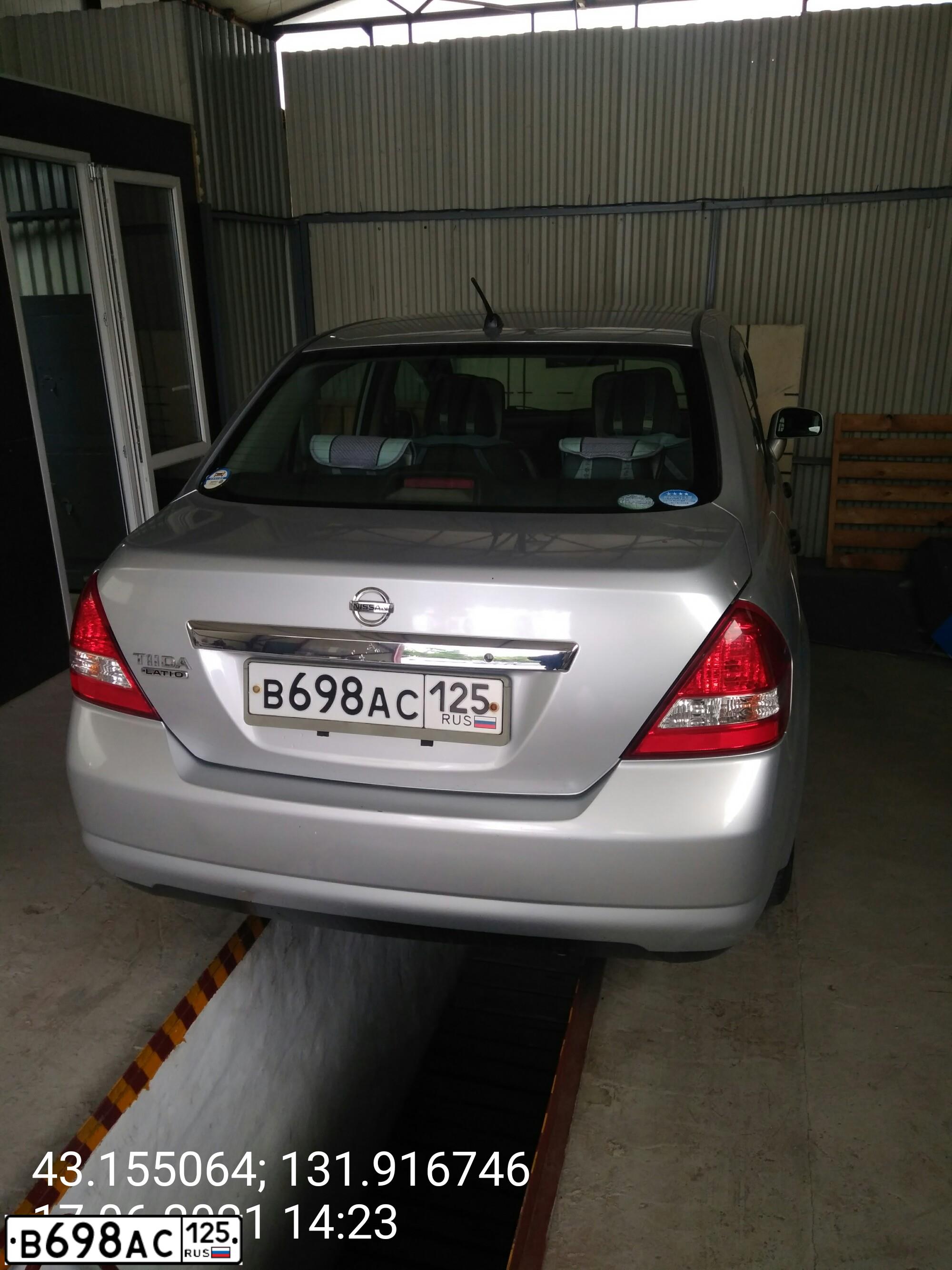 Фото автомобиля NISSAN TIIDA, 2009 — госномер Х336НМ03