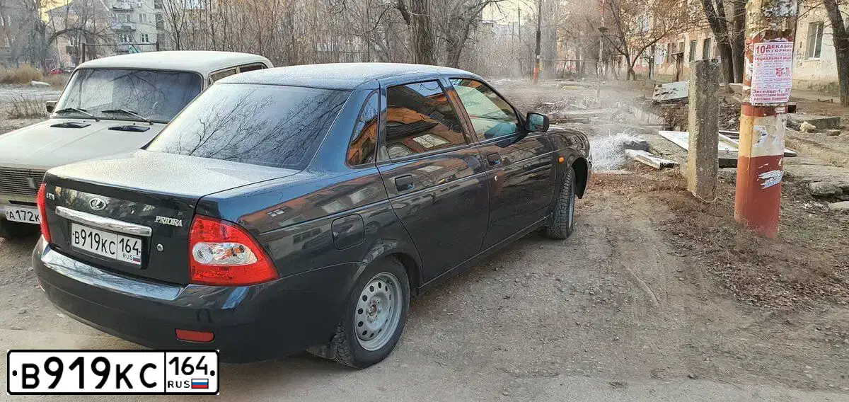 Фото автомобиля LADA 2170 PRIORA, 2007 — госномер В919КС164. Цвет: ТЕМНО ЗЕЛЕНЫЙ