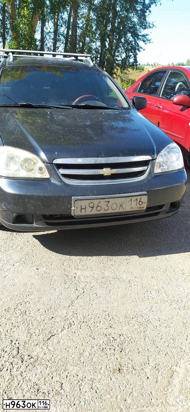 Фото автомобиля CHEVROLET LACETTI, 2010 — госномер Н963ОК116. Цвет: ЧЕРНЫЙ