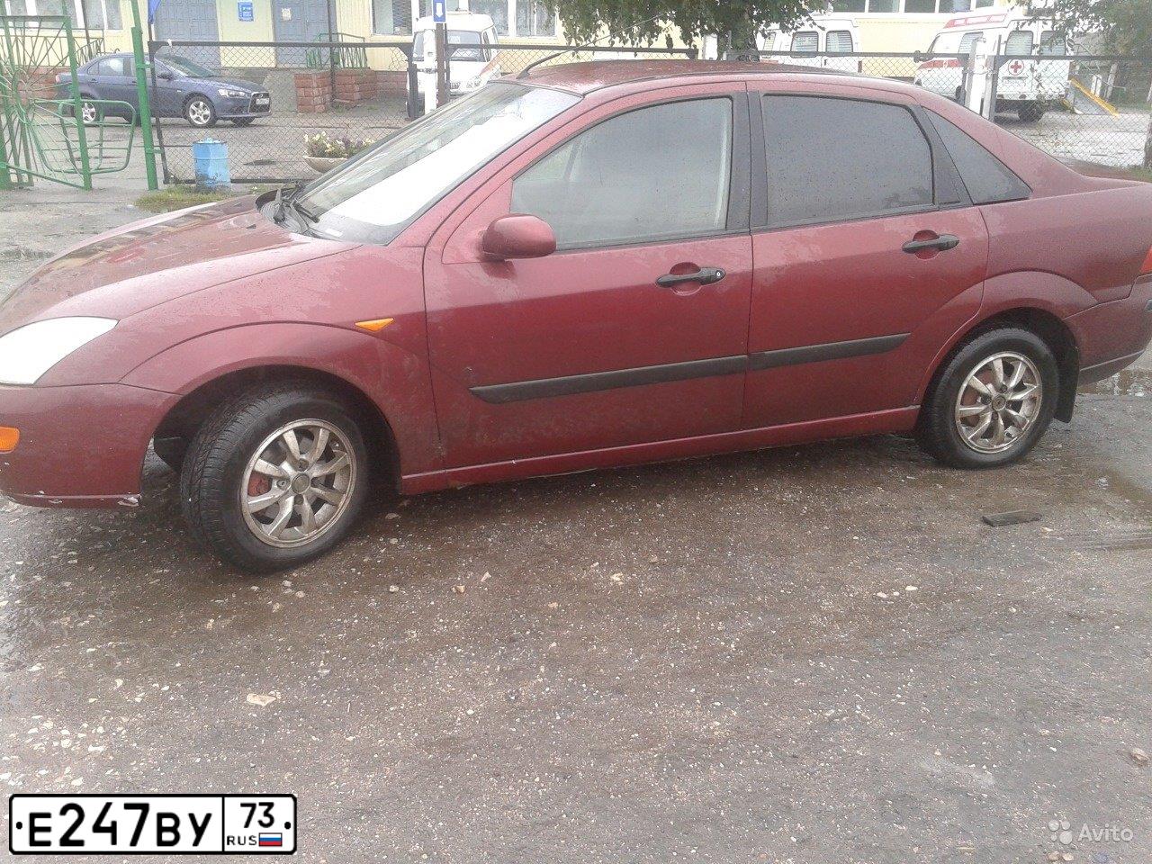 Фото автомобиля FORD FOCUS, 2003 — госномер Е247ВУ73. Цвет: ТЕМНО-КРАСНЫЙ