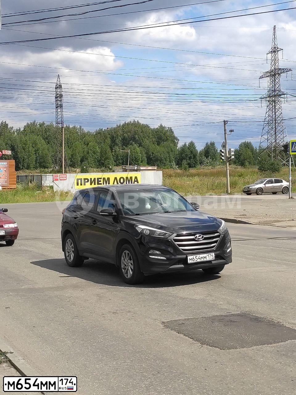 Фото автомобиля HYUNDAI TUCSON, 2015 — госномер М654ММ174. Цвет: ЧЕРНЫЙ
