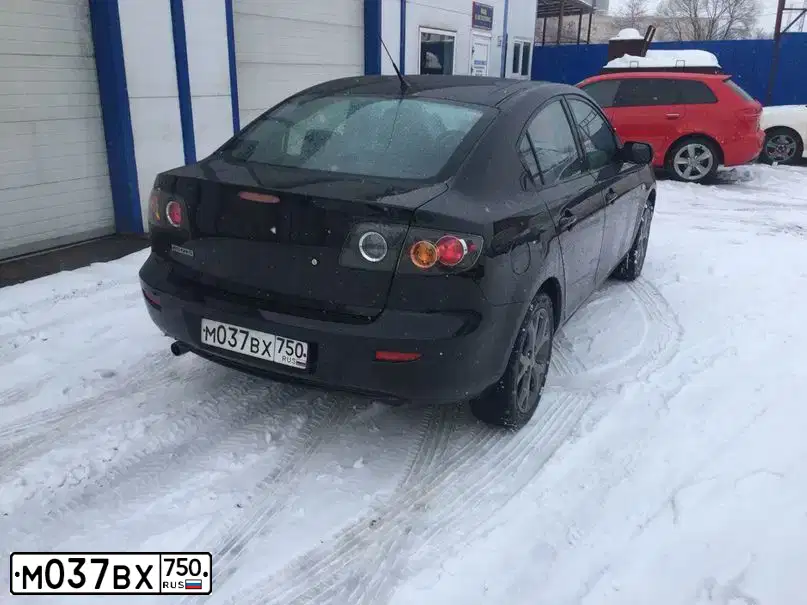 Фото автомобиля MAZDA 3, 2007 — госномер К288АО199. Цвет: ЧЕРНЫЙ