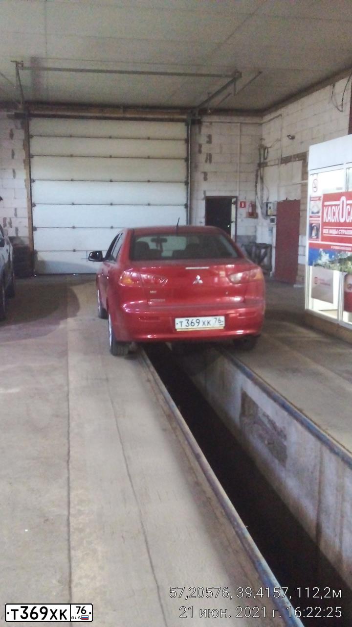 Фото автомобиля MITSUBISHI LANCER, 2007 — госномер С115ЕС76. Цвет: Красный