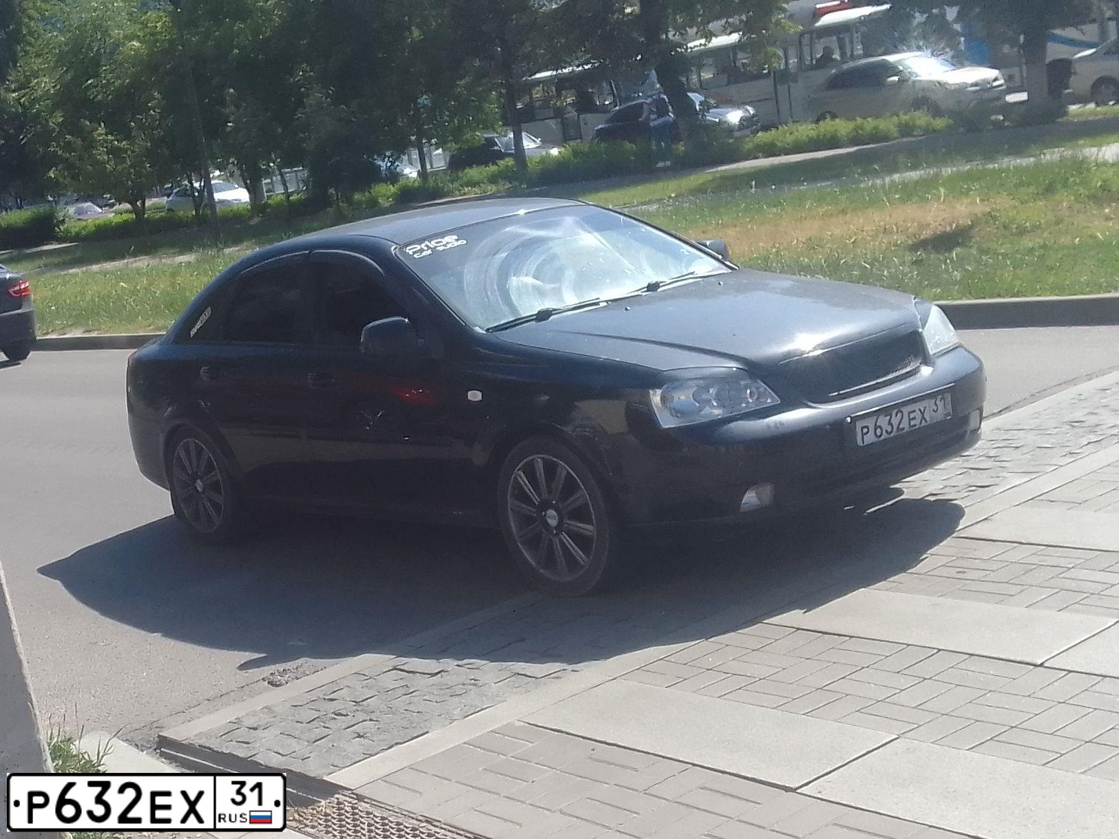 Фото автомобиля CHEVROLET LACETTI, 2010 — госномер Х643ТА31. Цвет: ЧЕРНЫЙ