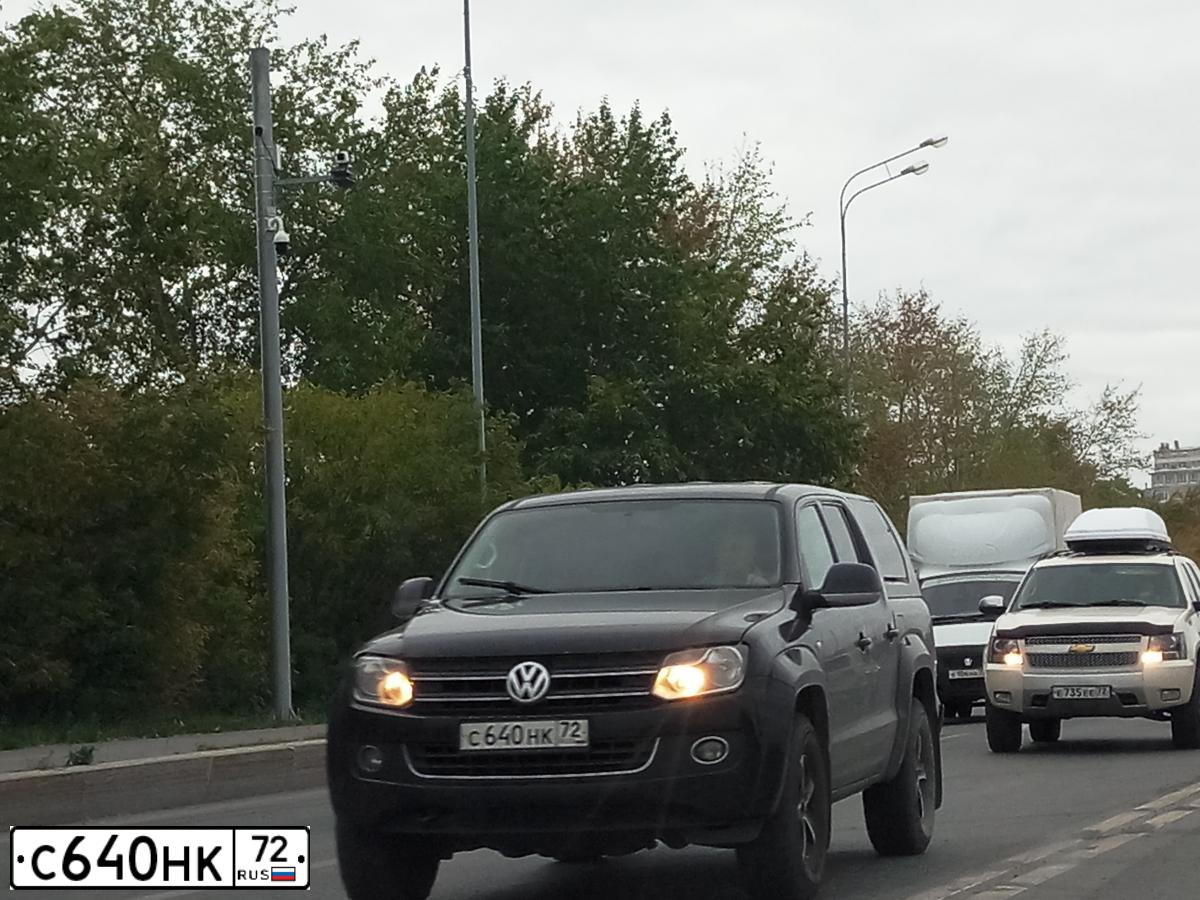 Фото автомобиля VOLKSWAGEN AMAROK, 2014 — госномер С640НК72. Цвет: ЧЕРНЫЙ