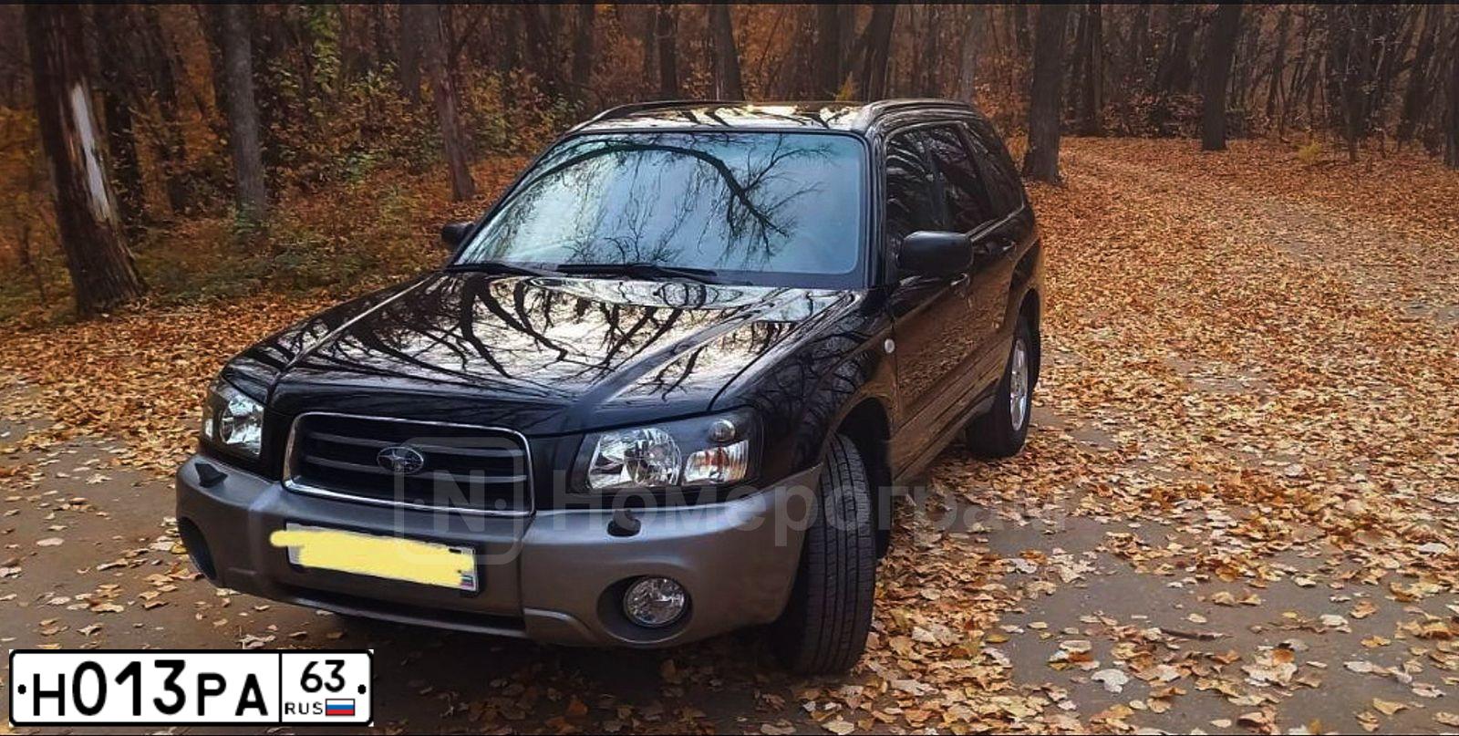 Фото автомобиля SUBARU FORESTER, 2005 — госномер Р779СХ26. Цвет: ЧЕРНЫЙ
