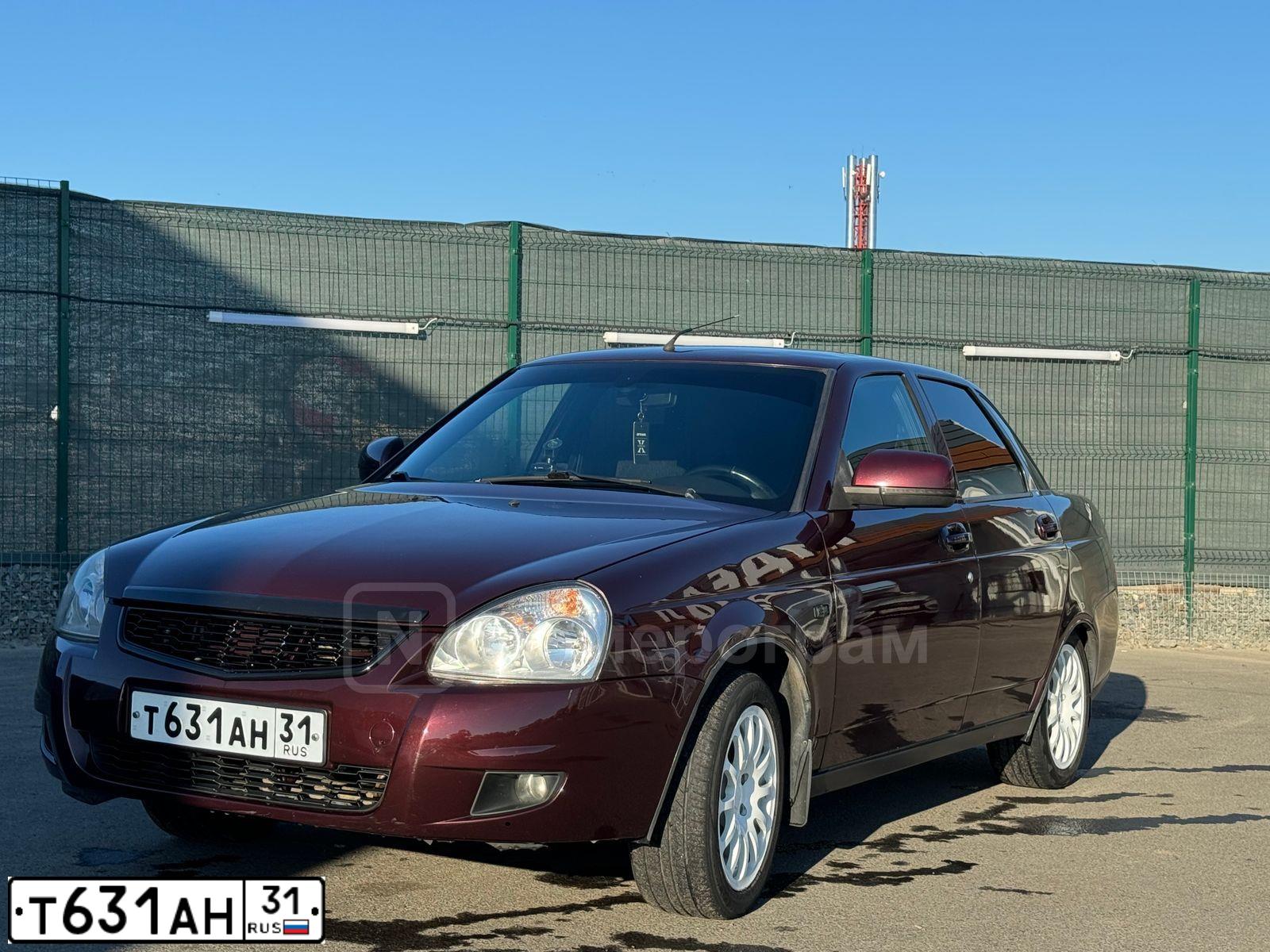 Фото автомобиля LADA PRIORA, 2014 — госномер Х423ХС31. Цвет: ТЕМНО-ВИШНЕВЫЙ