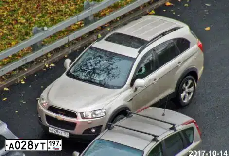Фото автомобиля CHEVROLET CAPTIVA, 2012 — госномер А028УТ197. Цвет: БЕЖЕВЫЙ
