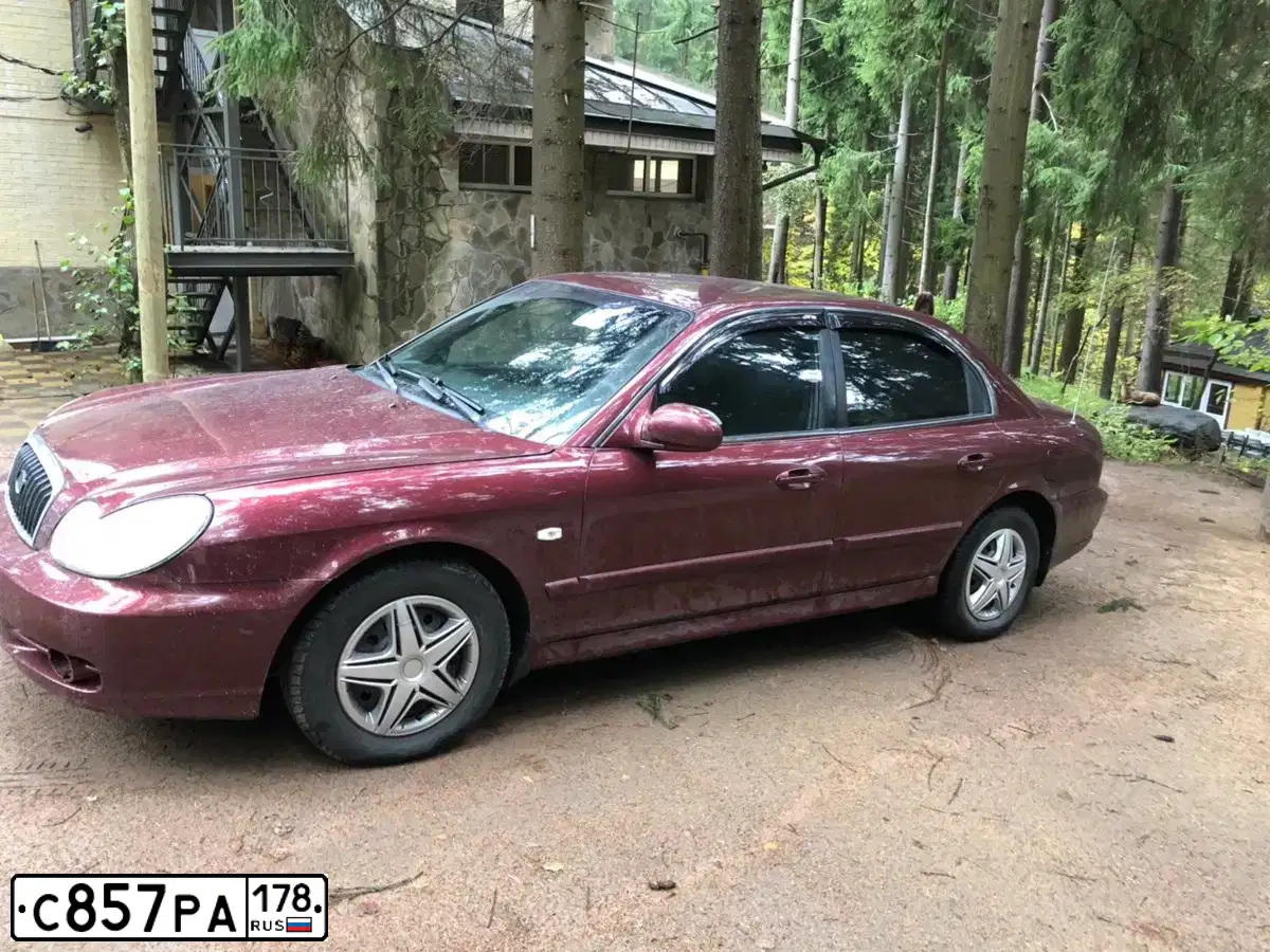 Фото автомобиля TAGAZ SONATA, 2007 — госномер Е680КО702. Цвет: Красный