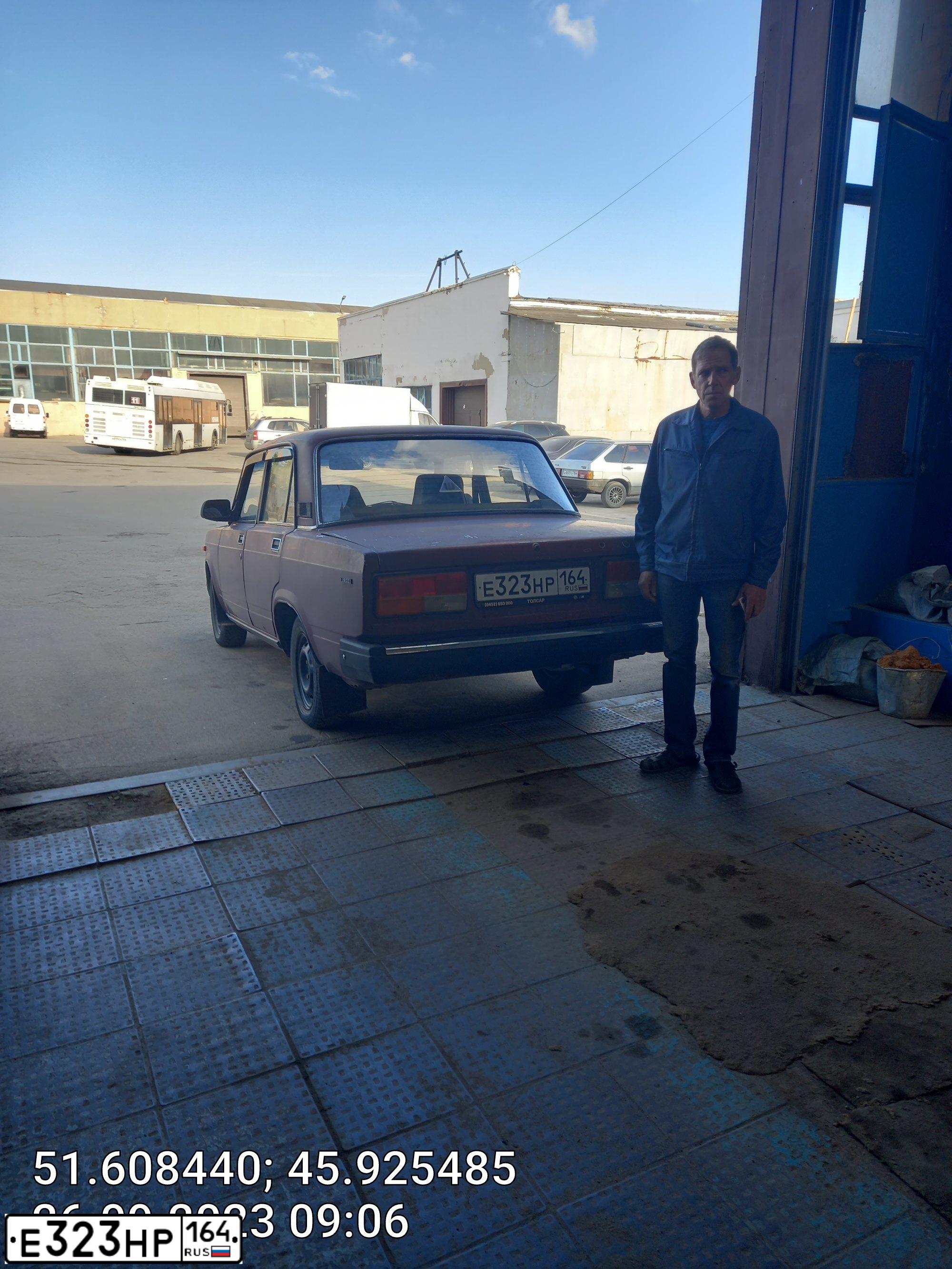 Фото автомобиля LADA 2107, 2003 — госномер Н962АХ164. Цвет: ТЕМНО-БОРДОВЫЙ