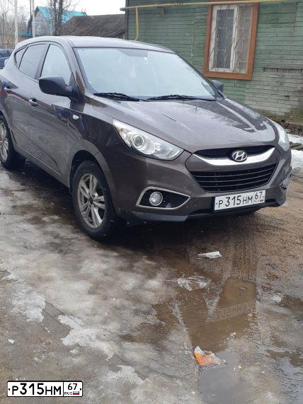 Фото автомобиля HYUNDAI IX35, 2013 — госномер Р315НМ67. Цвет: Коричневый