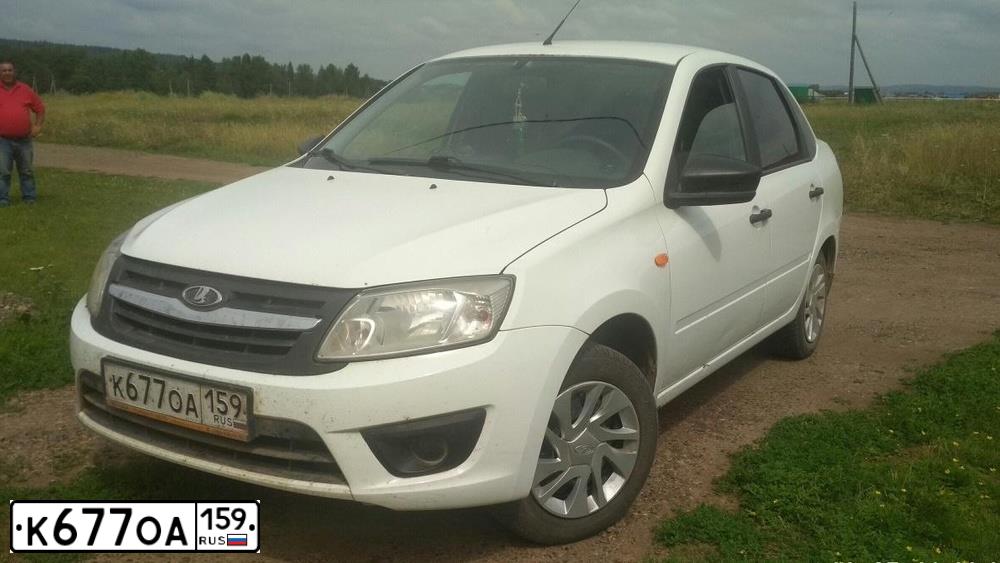 Фото автомобиля LADA 2190 GRANTA, 2016 — госномер К677ОА159. Цвет: БЕЛЫЙ