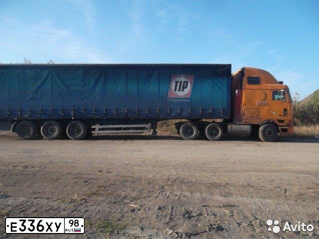 Фото автомобиля INTERNATIONAL HEAVY TRUCK 8500-9900, 1996 — госномер Е336ХУ98. Цвет: Оранжевый