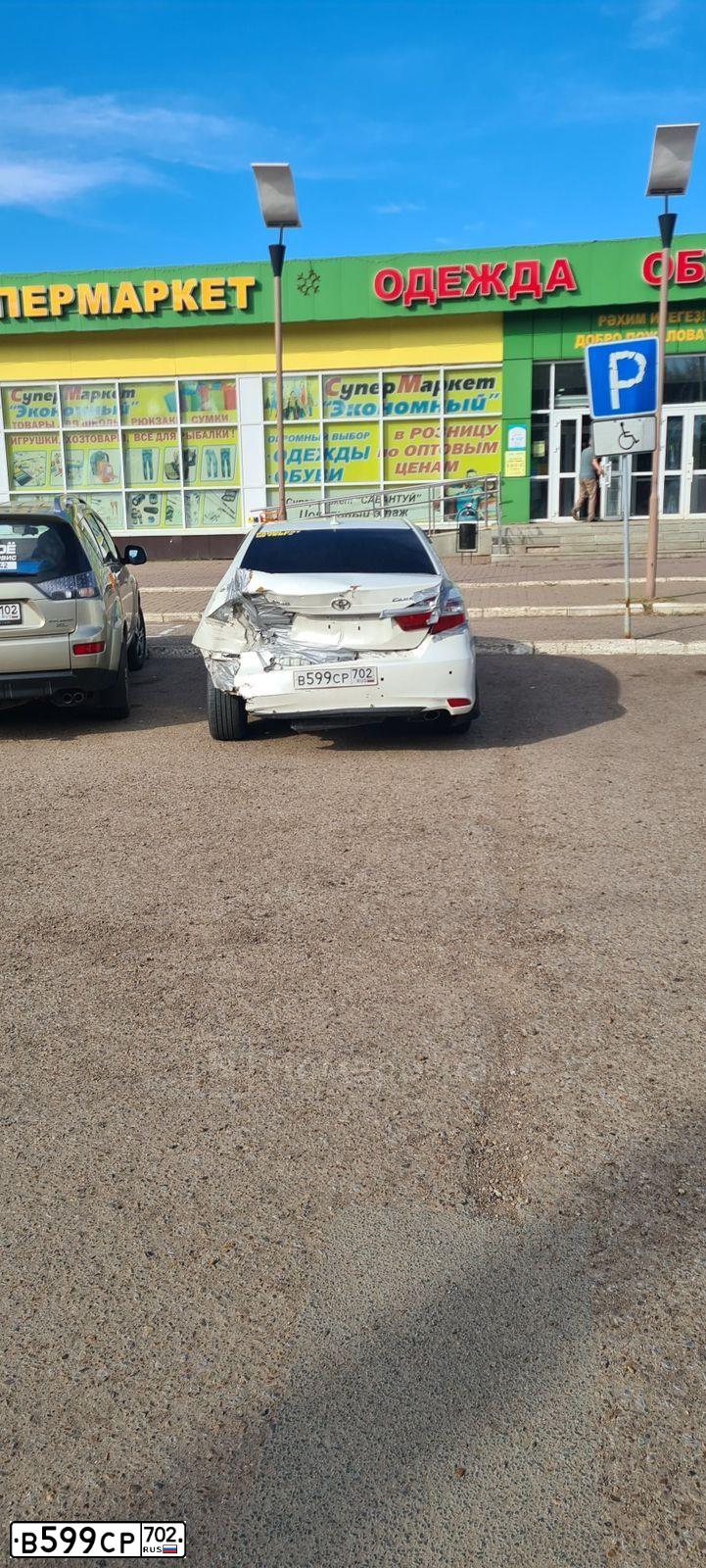 Фото автомобиля TOYOTA CAMRY, 2018 — госномер В599СР702. Цвет: БЕЛЫЙ ПЕРЛАМУТР