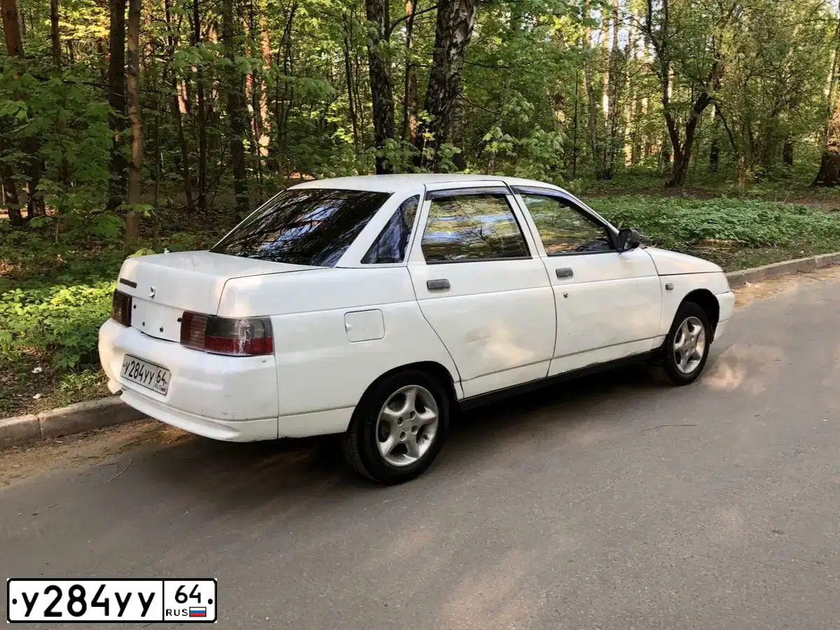 Фото автомобиля LADA 2110, 1999 — госномер К230ТУ750. Цвет: БЕЛЫЙ ЯРКИЙ