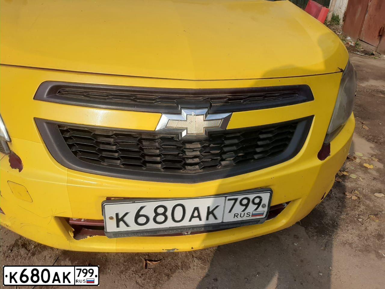 Фото автомобиля CHEVROLET COBALT, 2014 — госномер К680АК799. Цвет: ЖЁЛТЫЙ